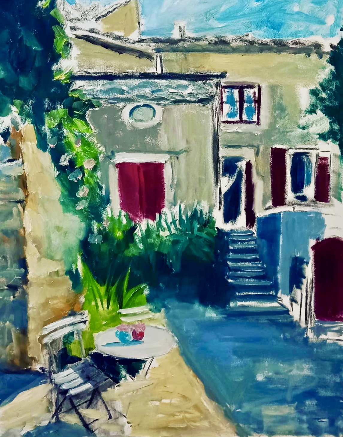 Sunlit courtyard with white chair, table and blue steps before a house with burgundy shutters, oil on canvas by Sonya Tanios